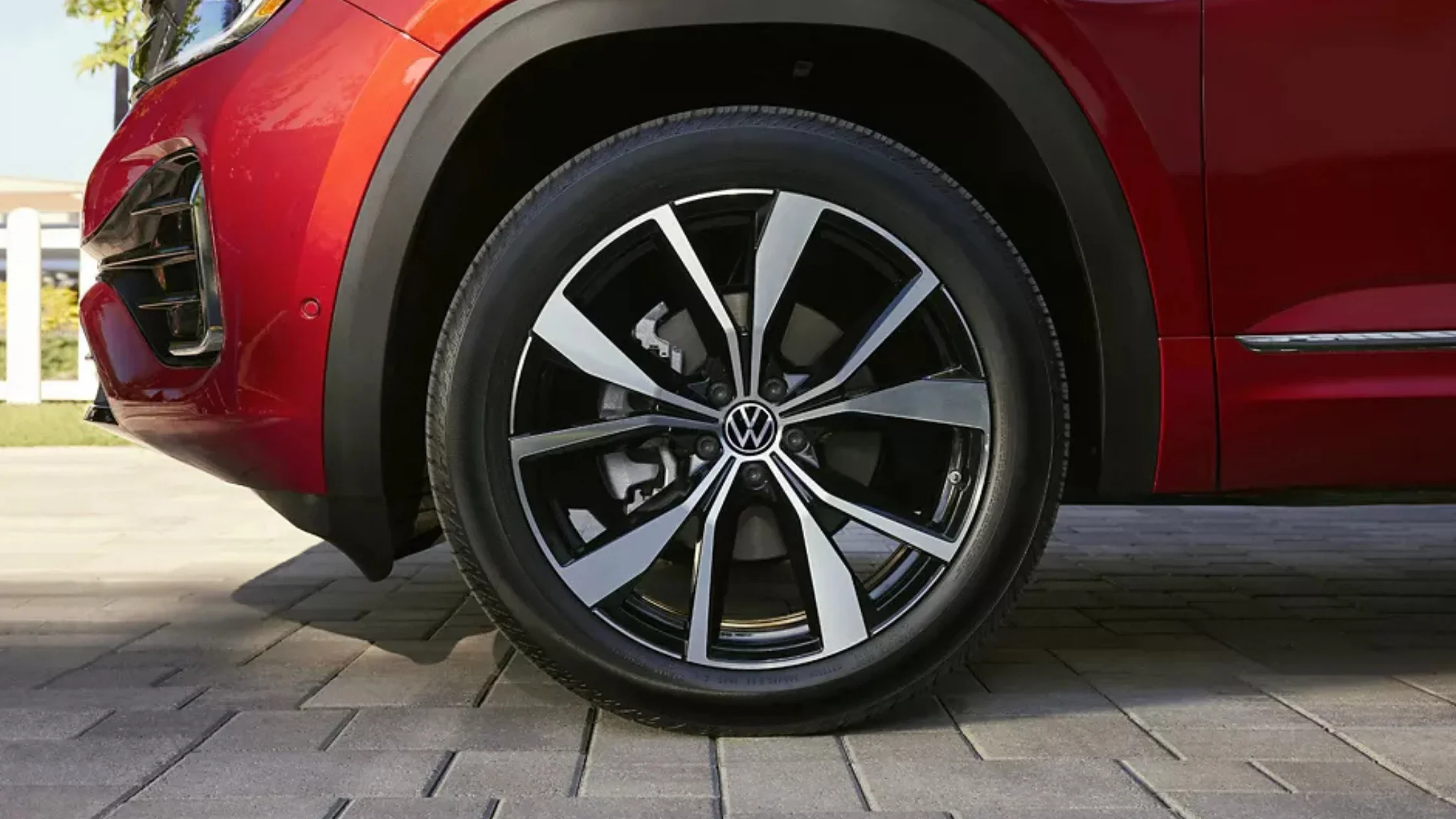 Close-up of 2025 Volkswagen Atlas alloy wheel with black and silver spoke design
