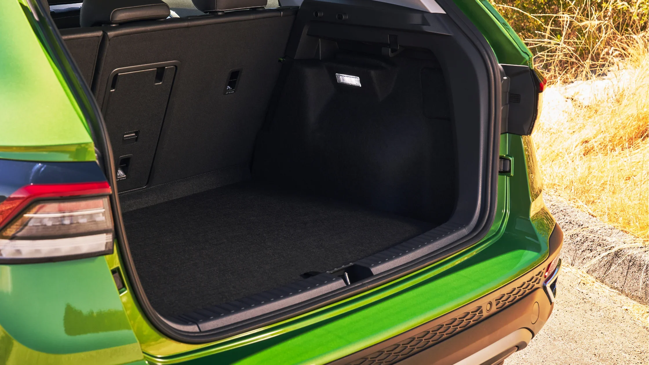 Open cargo area of the 2025 Volkswagen Taos showcasing spacious trunk.