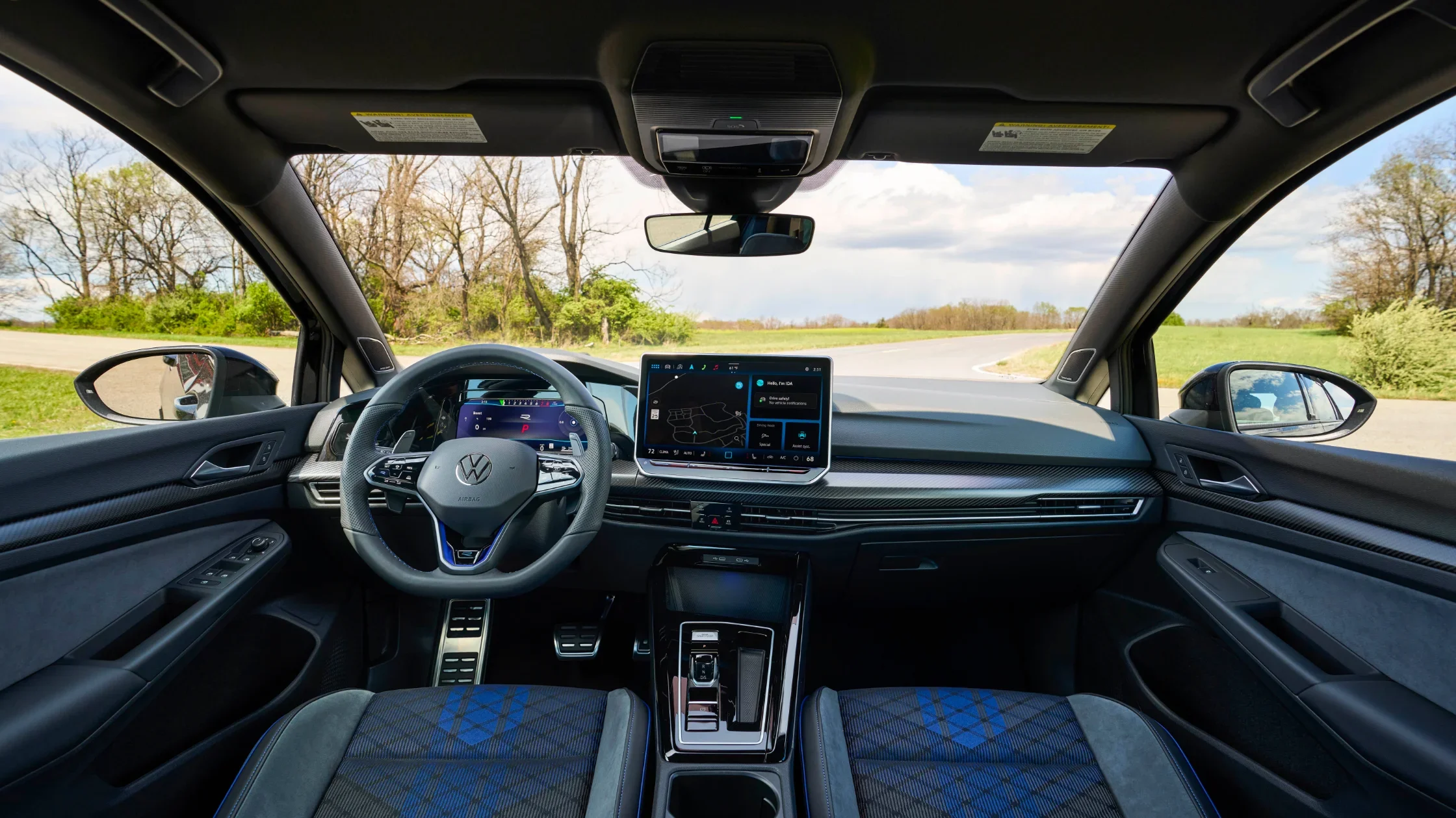 2025 Volkswagen Golf R dashboard with digital cockpit and performance-focused layout.
