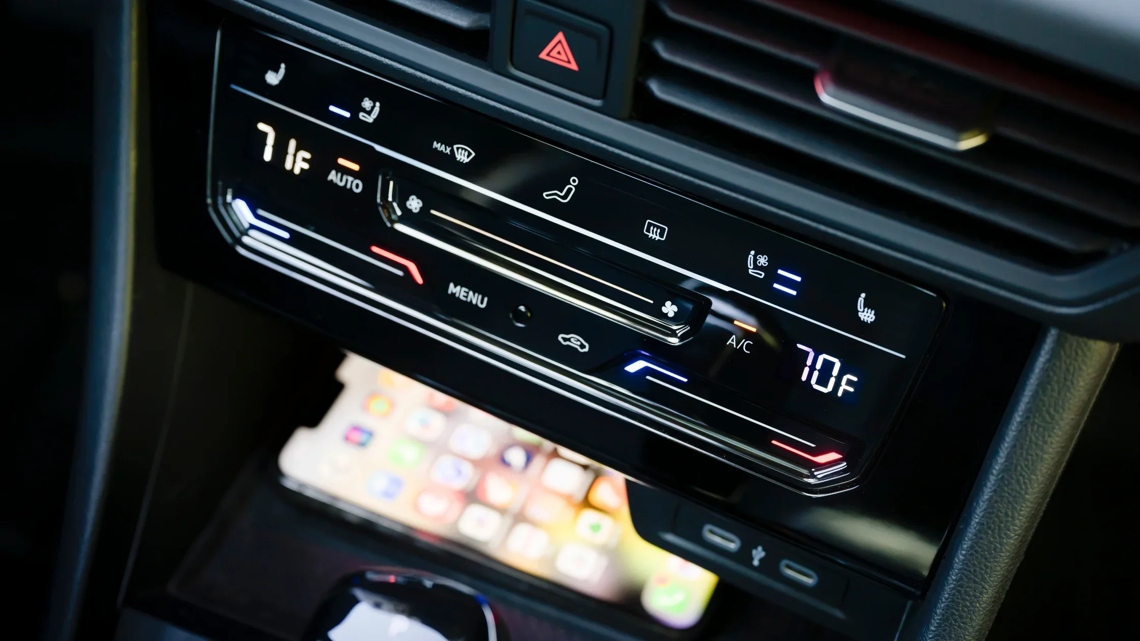 Close-up of the digital climate control system in the 2025 Volkswagen Jetta, displaying dual temperature settings and modern touch controls.