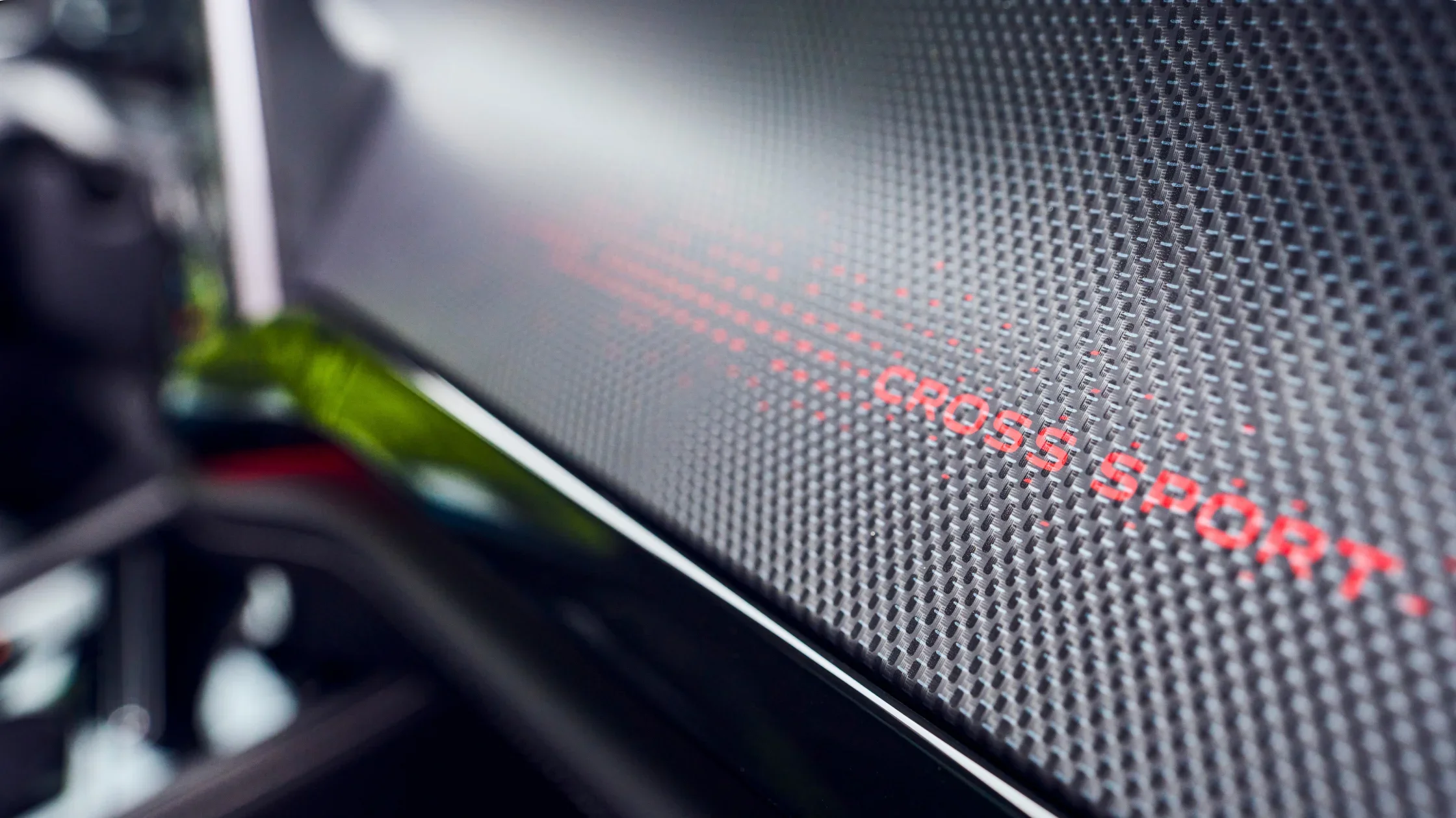 2025 Volkswagen Atlas Cross Sport dashboard with textured trim and red Cross Sport branding.