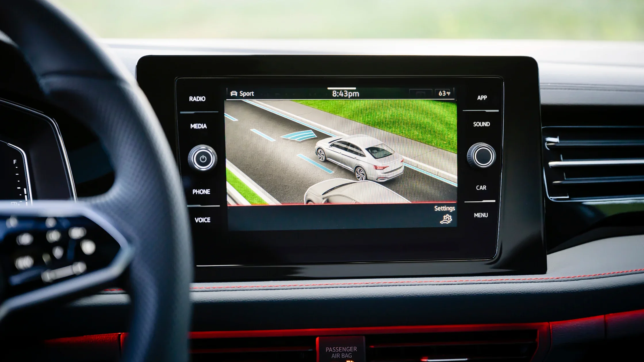 2025 Volkswagen Jetta GLI digital gauge cluster displaying fuel economy and speed.