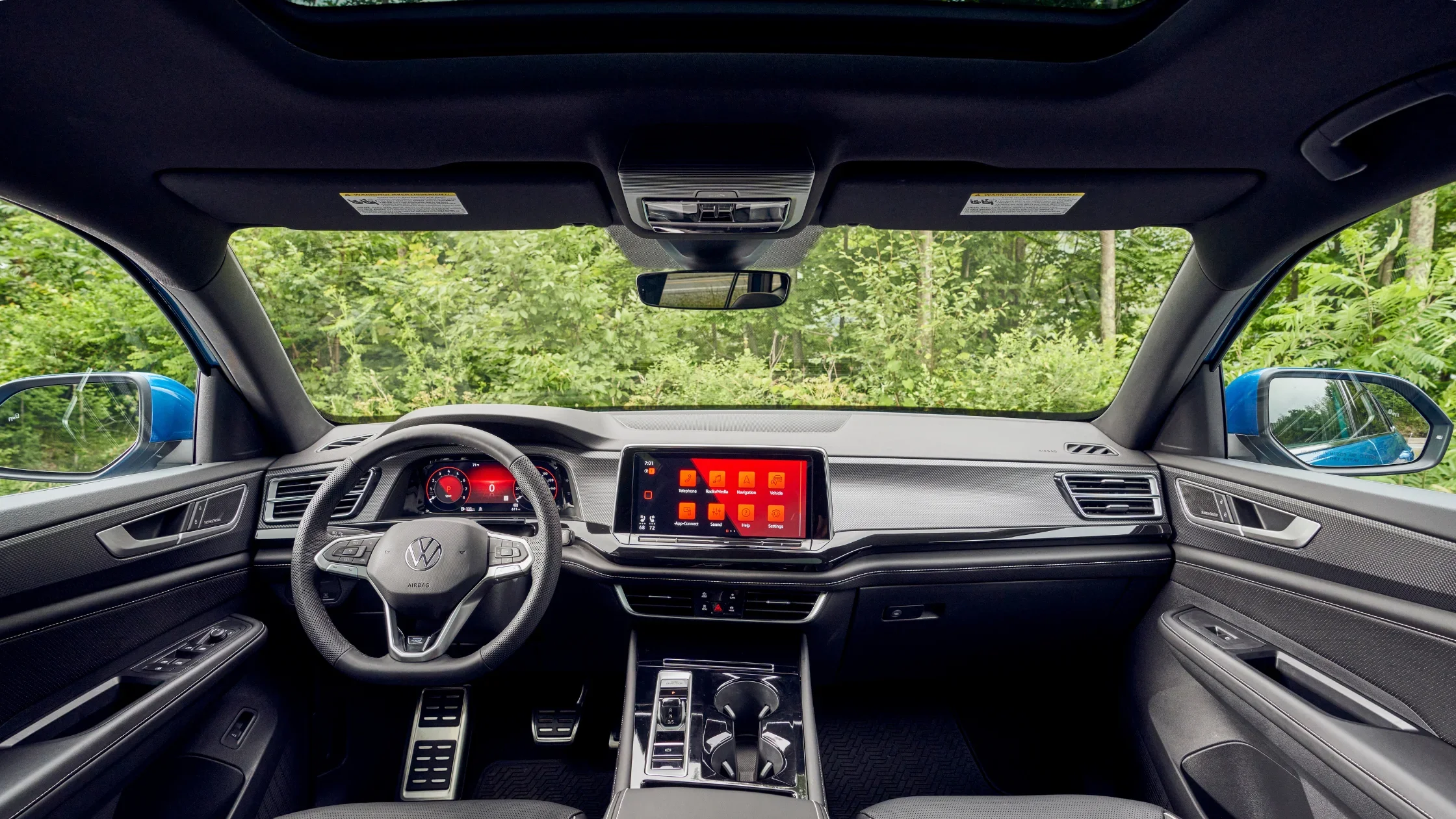 2026 Volkswagen Atlas Cross Sport dashboard interior with digital cockpit and console.
