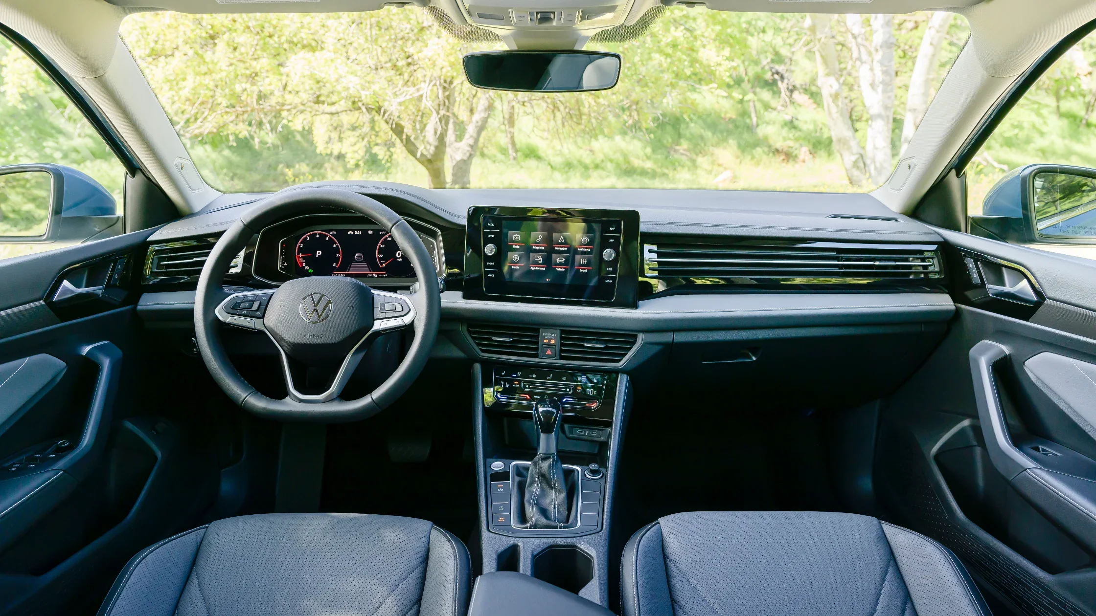 2025 Volkswagen Jetta interior with a digital cockpit and touchscreen.