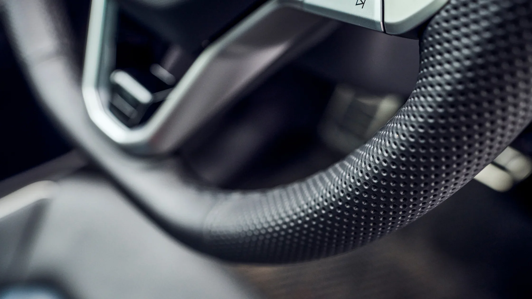 2026 Volkswagen Atlas Cross Sport interior dashboard view with digital display and infotainment.