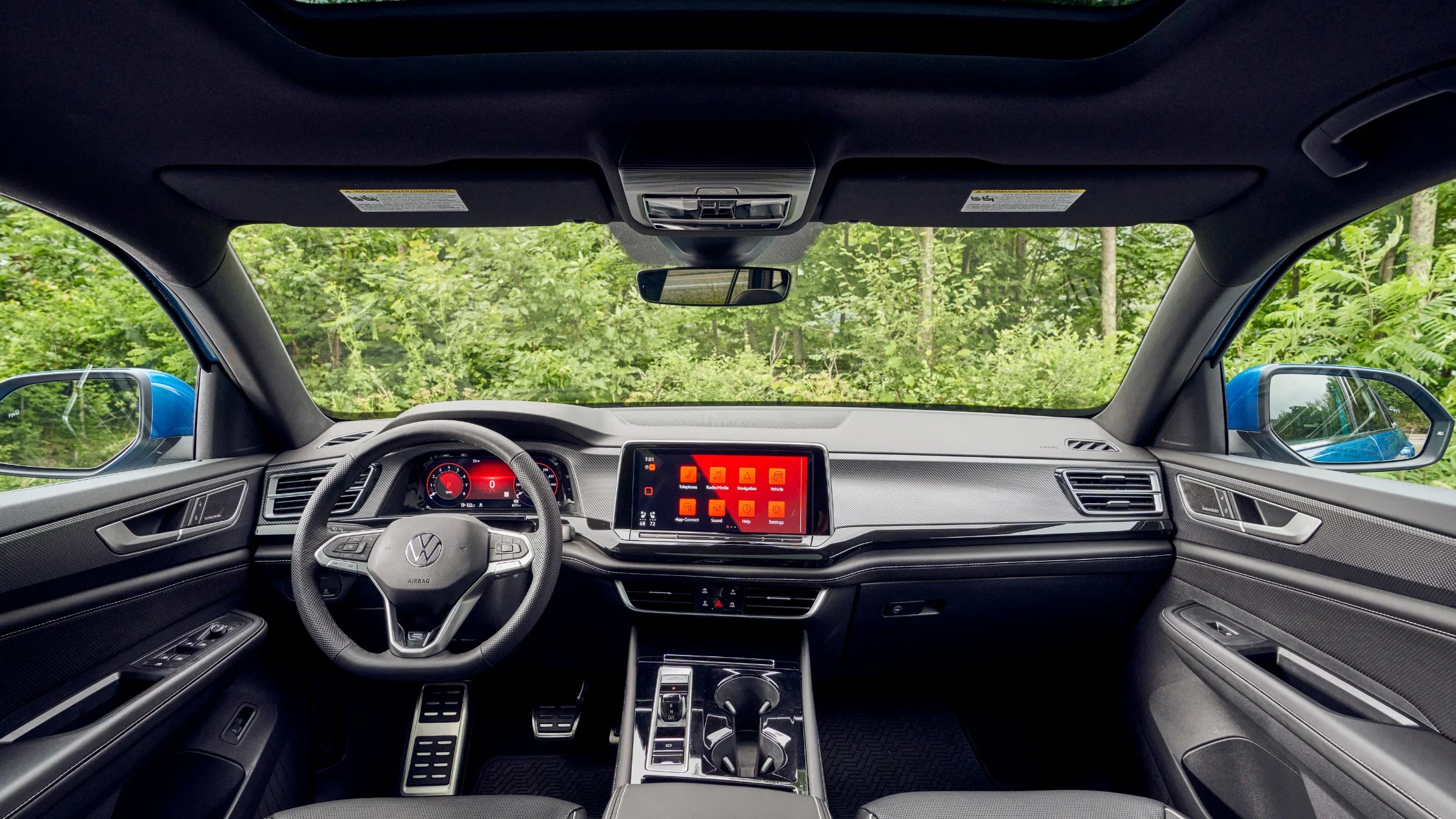 2026 Volkswagen Atlas Cross Sport front seats with black leather upholstery and contrast stitching.